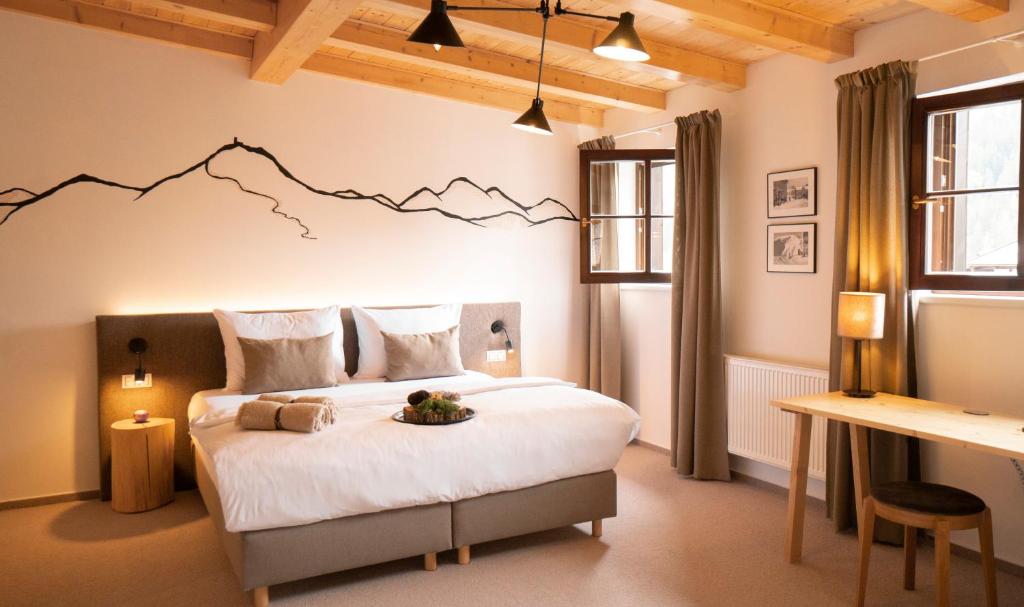 Postel nebo postele na pokoji v ubytování Hotel Soyka