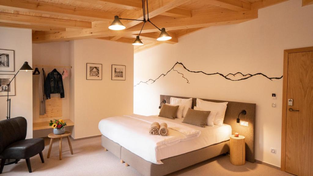 Postel nebo postele na pokoji v ubytování Hotel Soyka