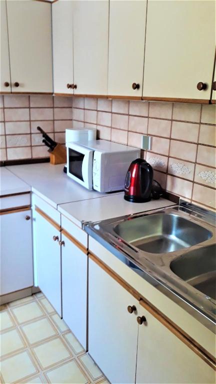 Kuchyňa alebo kuchynka v ubytovaní Apartment Modric