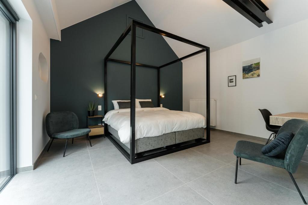 Postel nebo postele na pokoji v ubytování B&B Tannerie