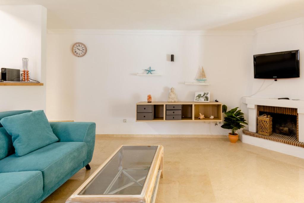 TV a/nebo společenská místnost v ubytování Apartamento Confortable Urbanización El Paraiso