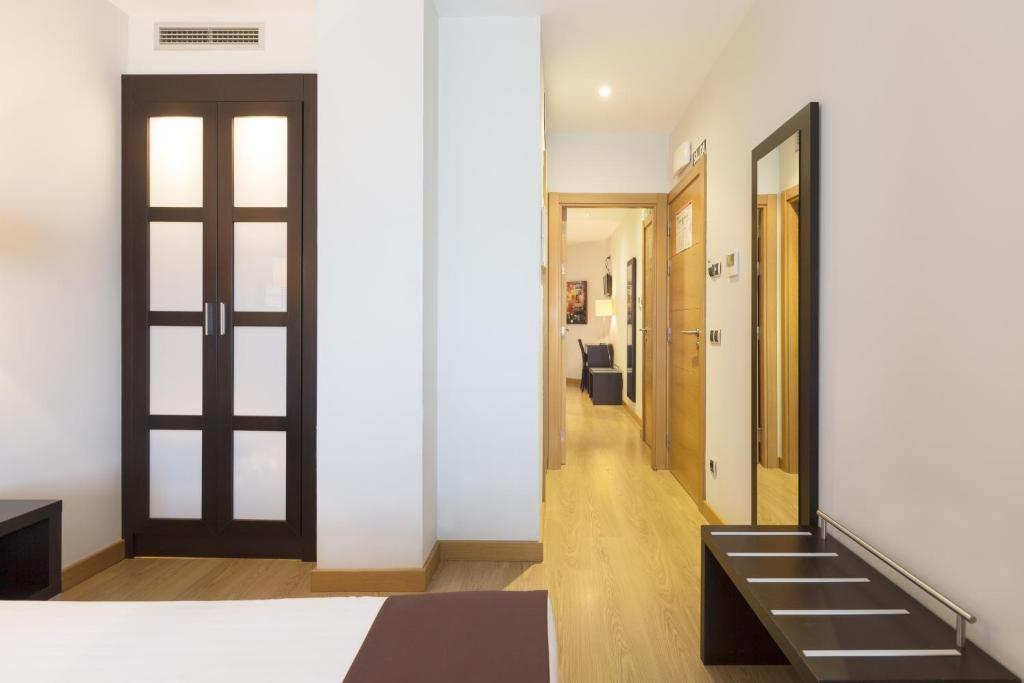 Postel nebo postele na pokoji v ubytování Hotel Plazaola