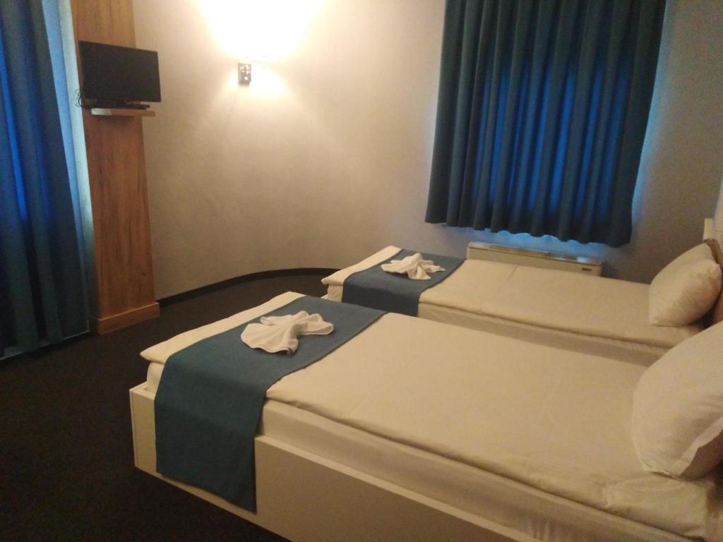Postel nebo postele na pokoji v ubytování Hotel Fors