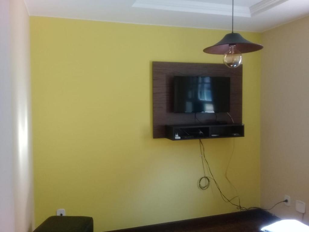 A television and/or entertainment centre at Apartamento Duplex no melhor bairro de NF