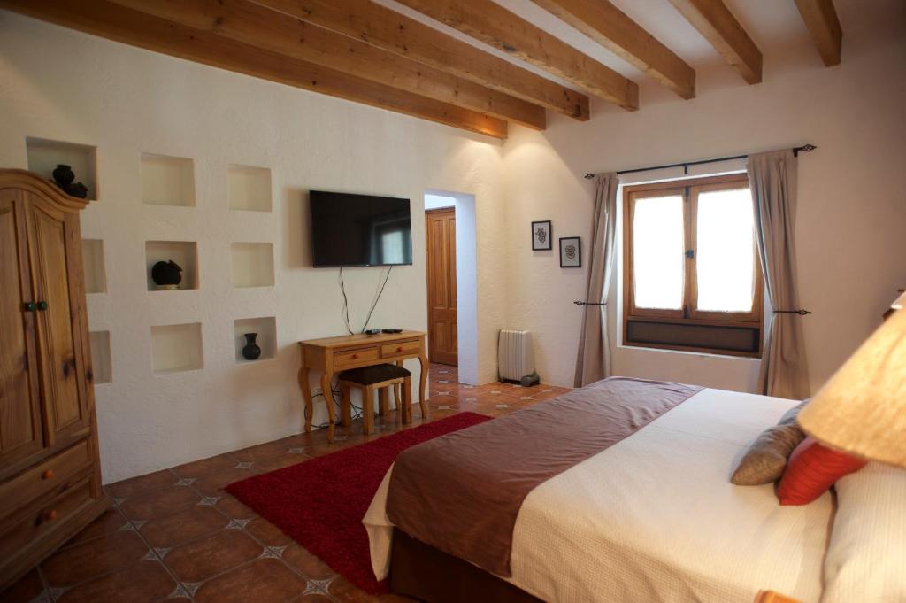 Postel nebo postele na pokoji v ubytování La Casona de los Colibríes