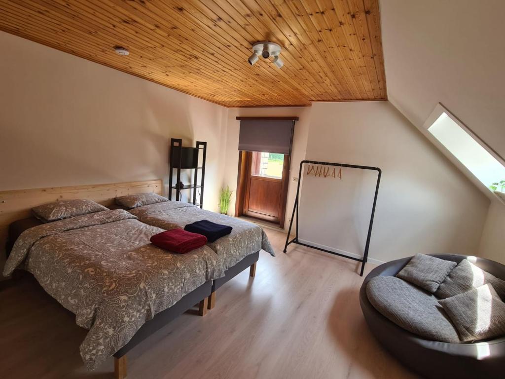 Postel nebo postele na pokoji v ubytování Tussenbeke