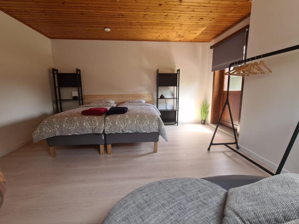 Postel nebo postele na pokoji v ubytování Tussenbeke