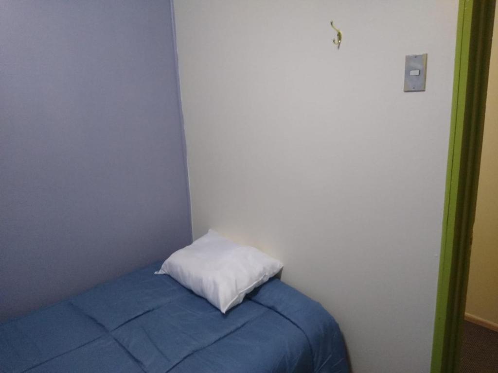 Postel nebo postele na pokoji v ubytování Islanet Hostel & Bar