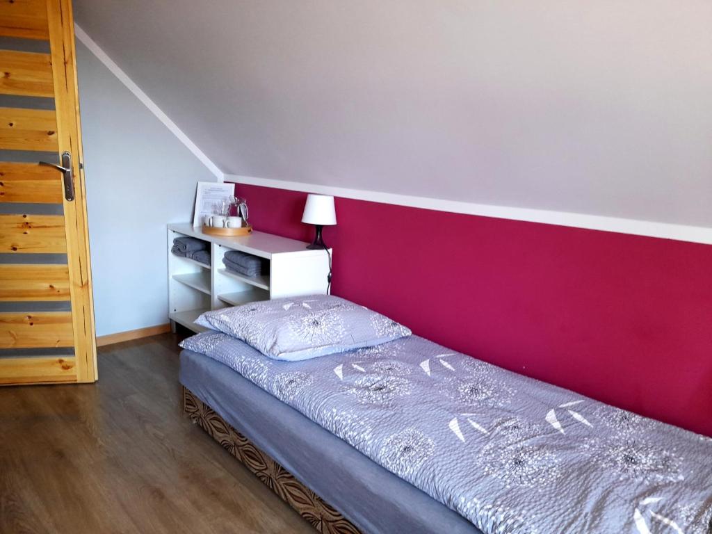 Posteľ alebo postele v izbe v ubytovaní Sowinka