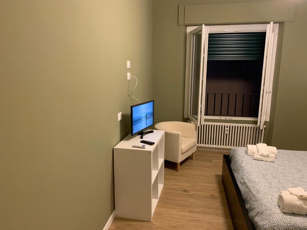 Postel nebo postele na pokoji v ubytování B&B Fossatello affittacamere