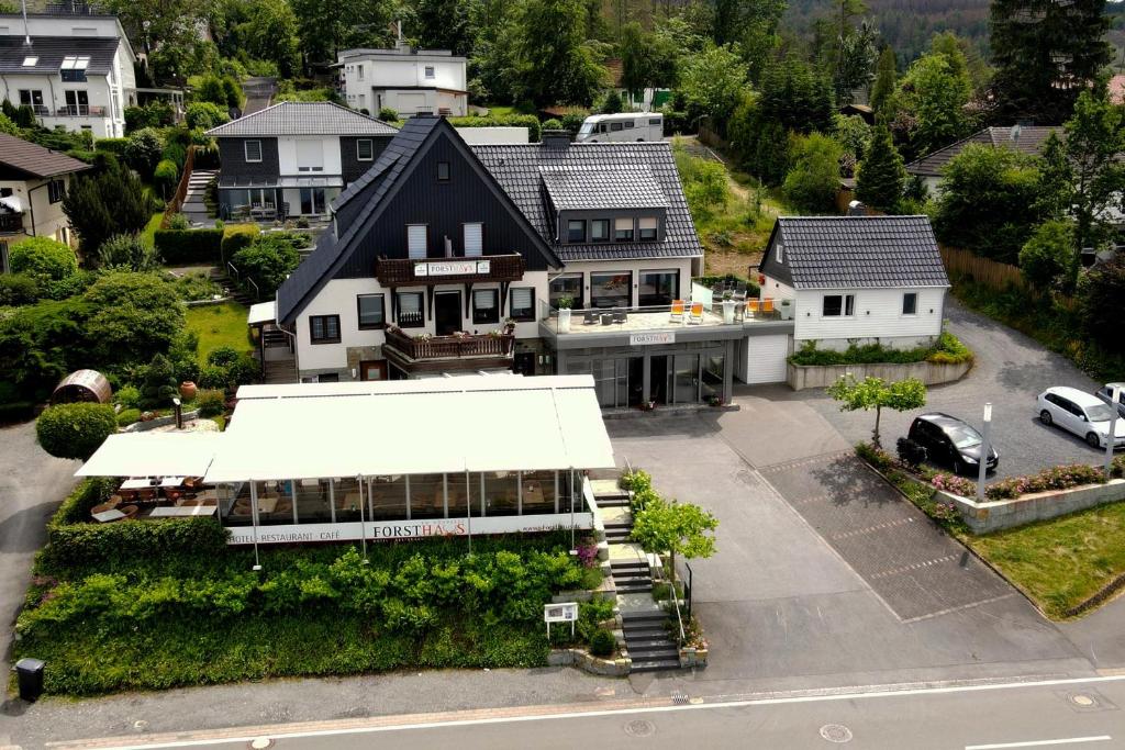 an aerial view of a house with a garage at Forsthaus am Möhnesee in Möhnesee