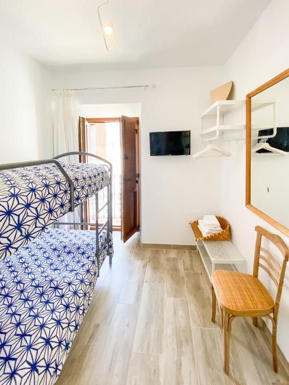 Postel nebo postele na pokoji v ubytování Casa La Aduana
