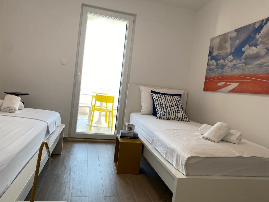 Postel nebo postele na pokoji v ubytování Apartman Roko Duboka by aneo travel