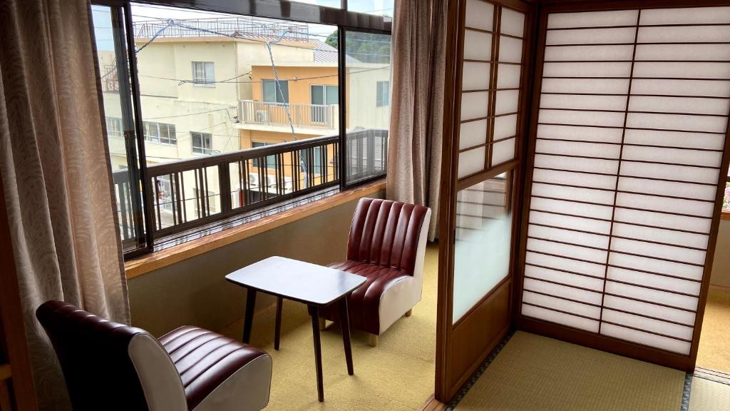 Balkón nebo terasa v ubytování ゲストハウス　華屋 (guest house HANAYA）