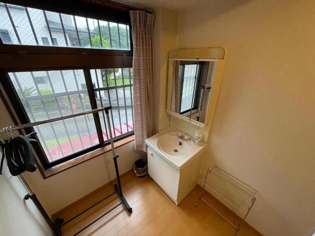 Koupelna v ubytování Hotel Isodokei