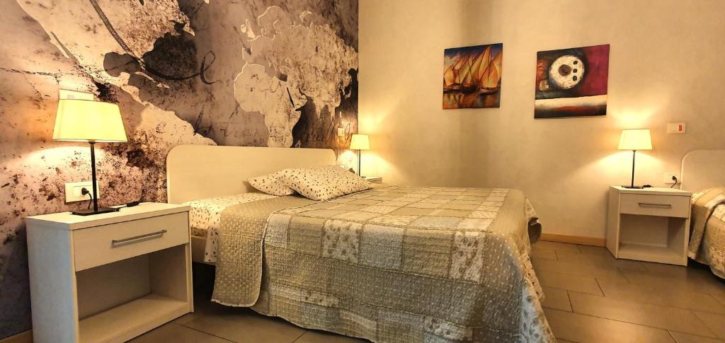 Postel nebo postele na pokoji v ubytování Affittacamere Borgo Sabbionara