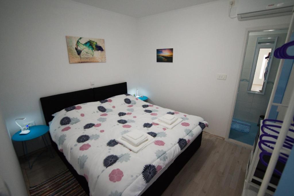 Postel nebo postele na pokoji v ubytování Apartment SunSet Dubrovnik FREE PARKING & WIFI