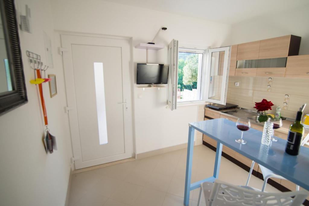 Kuchyň nebo kuchyňský kout v ubytování Apartment SunSet Dubrovnik FREE PARKING & WIFI