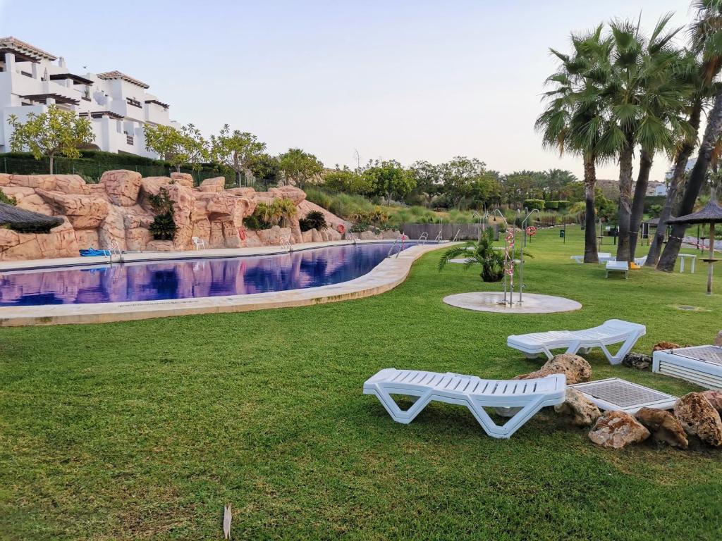 Bazén v ubytování Apartamento VeraTespera - Cerca de la Playa con WiFi, Piscina y Ocio Familiar nebo v jeho okolí