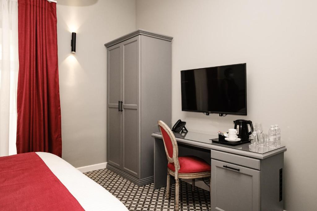 Postel nebo postele na pokoji v ubytování Casa Reale Boutique Hotel