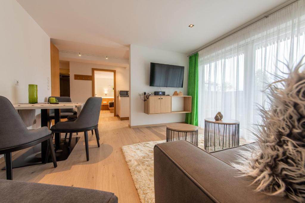 TV a/nebo společenská místnost v ubytování Lapis Monti - Apartments & Suites