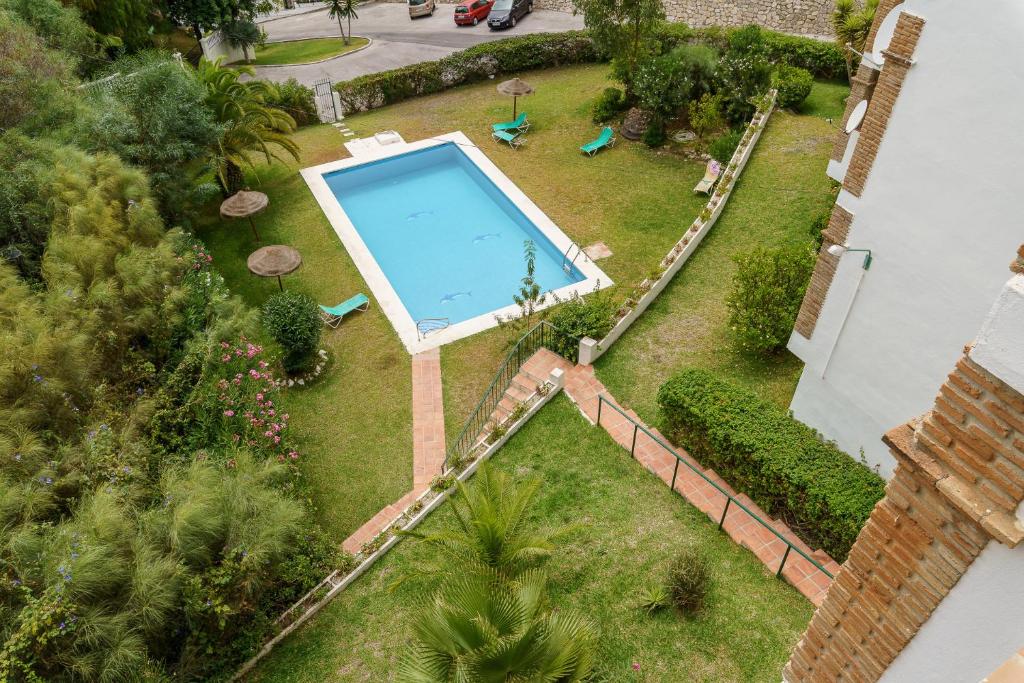 Bazén v ubytování Malagasuite Pool Benalmadena nebo v jeho okolí