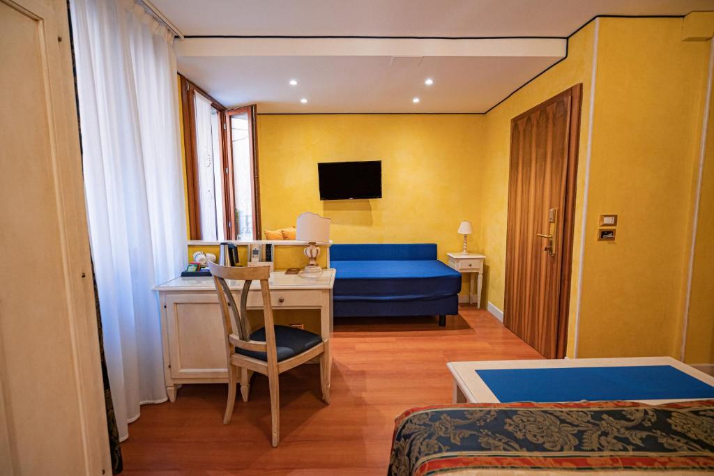 TV a/nebo společenská místnost v ubytování Hotel Al Piave