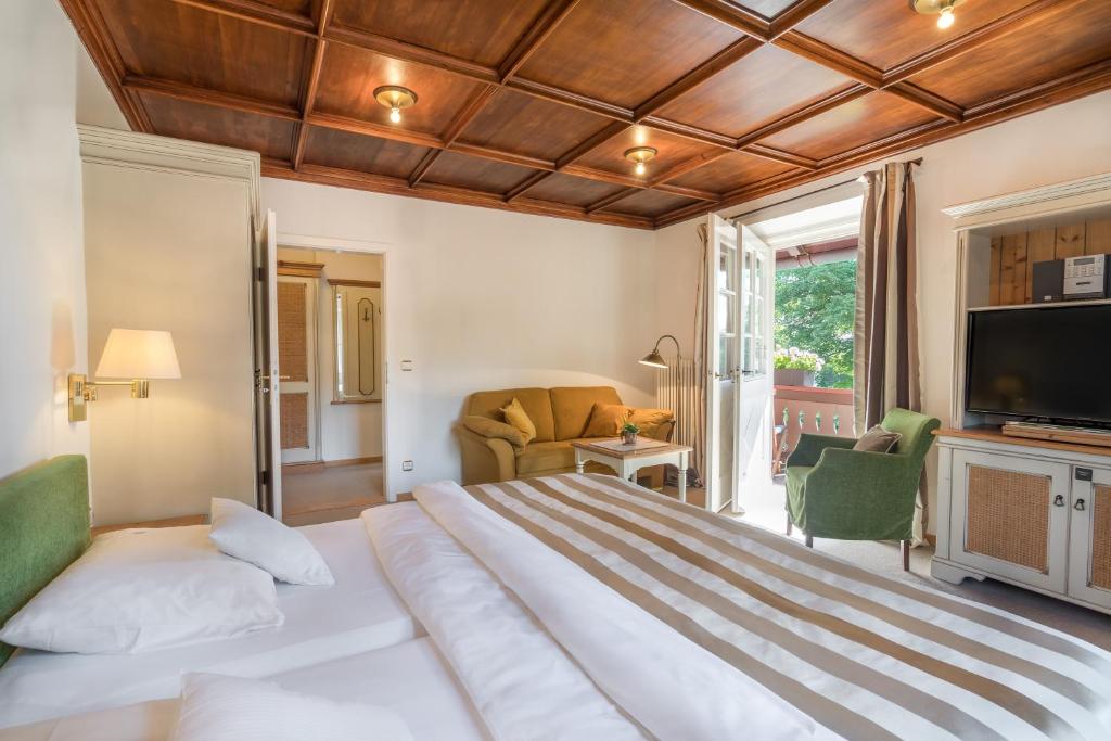 TV a/nebo společenská místnost v ubytování Geldernhaus Hotel garni