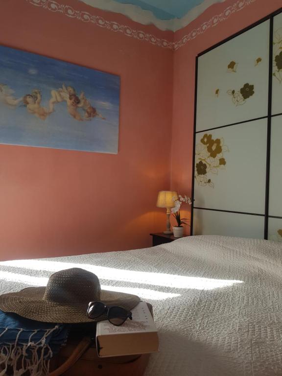 Postel nebo postele na pokoji v ubytování Dimora in Francigena