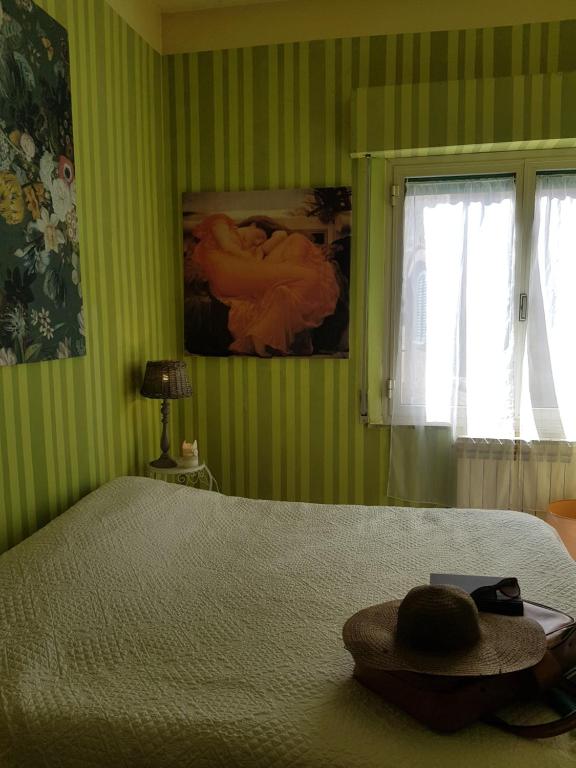 Postel nebo postele na pokoji v ubytování Dimora in Francigena