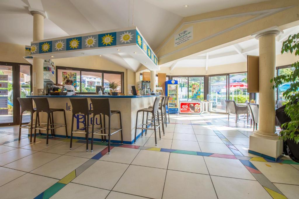 Restaurace v ubytování Résidence Pierre & Vacances Les Parcs de Grimaud
