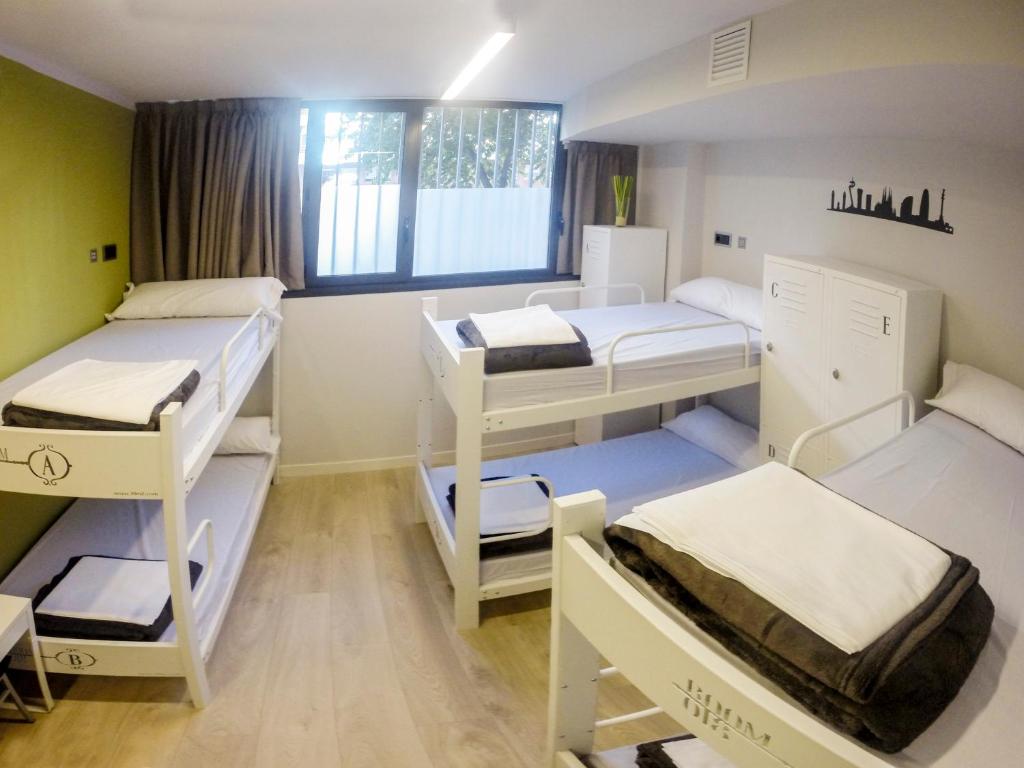 Posteľ alebo postele v izbe v ubytovaní Room018BCN