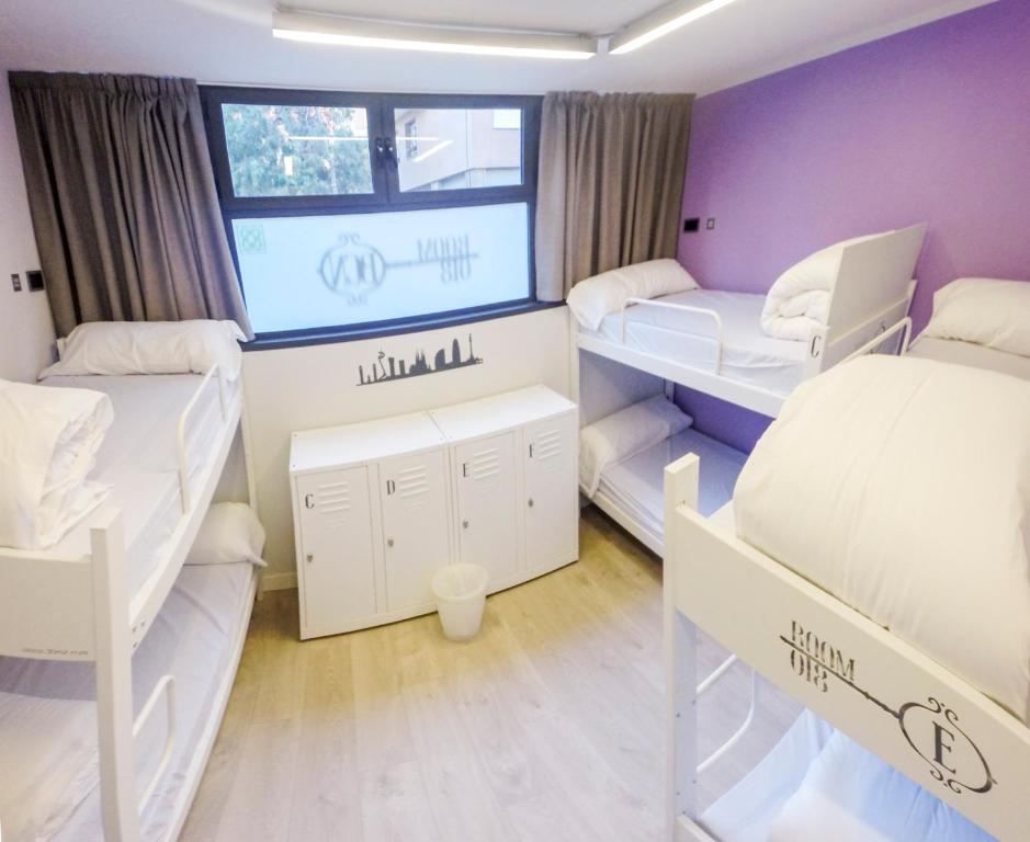 Posteľ alebo postele v izbe v ubytovaní Room018BCN