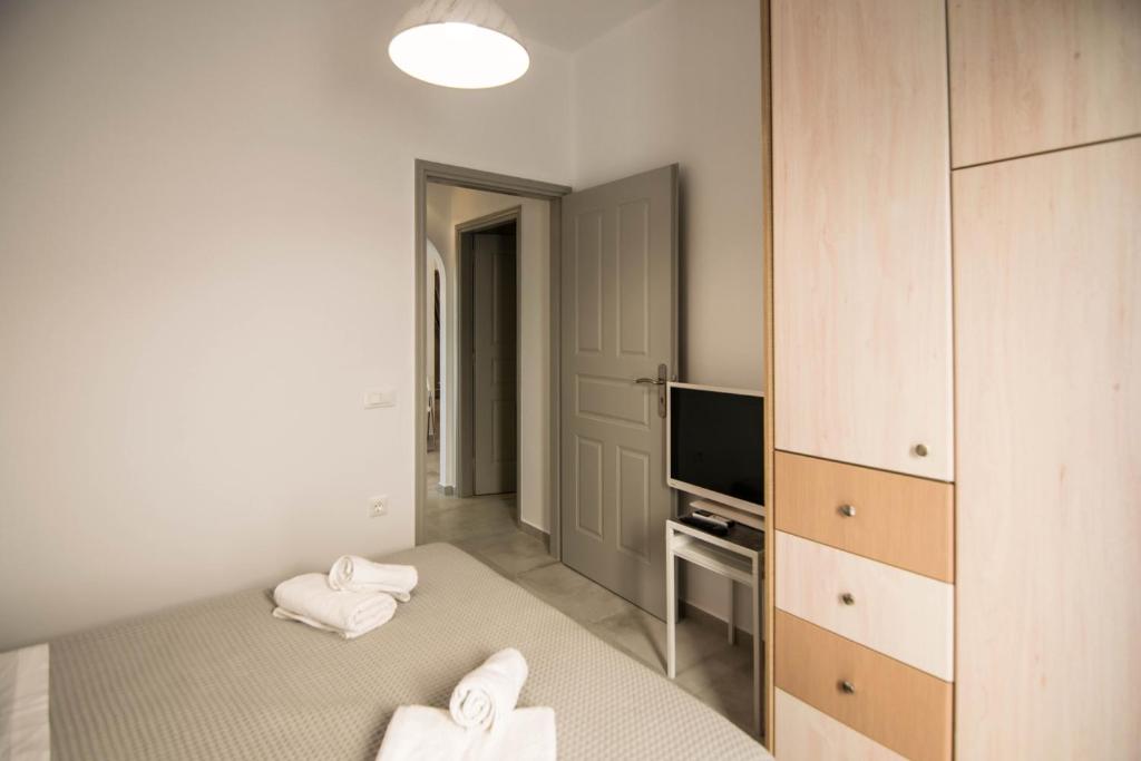 Posteľ alebo postele v izbe v ubytovaní Santorini Garden Homes