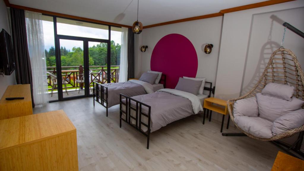 A bed or beds in a room at İspendam Tess Otel