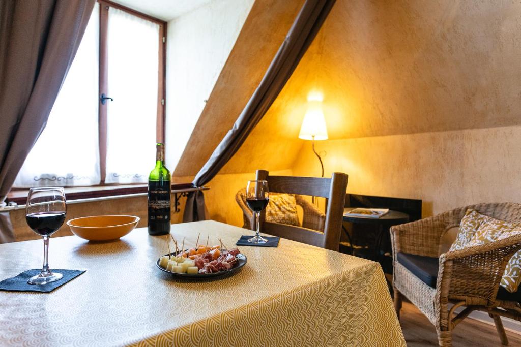 Posezení v ubytování Gîtes Un Jardin dans la Falaise