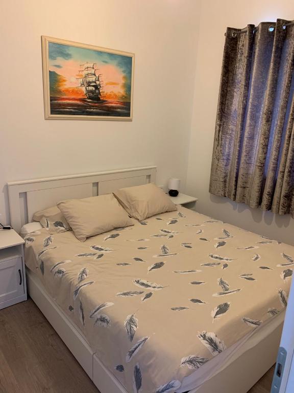 Postel nebo postele na pokoji v ubytování Hygge Apartments