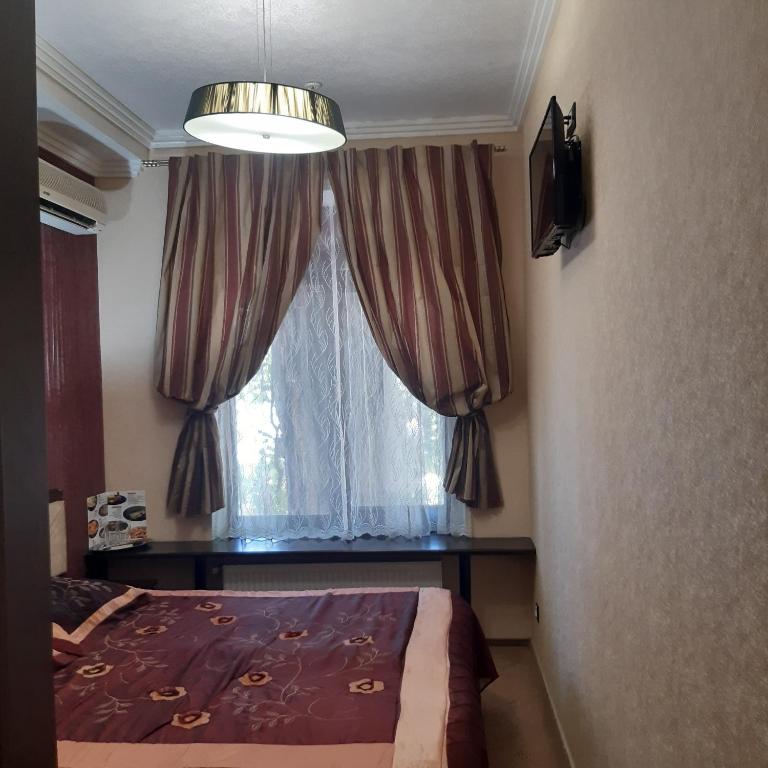 Postel nebo postele na pokoji v ubytování Annabelle отель