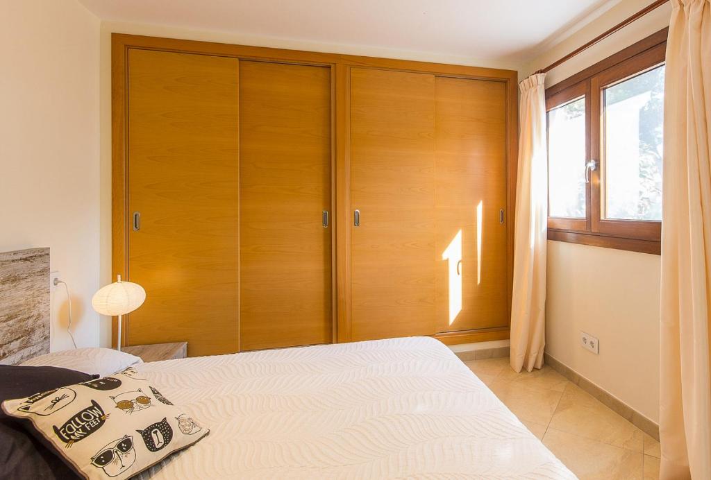Postel nebo postele na pokoji v ubytování Casa de los Pinos