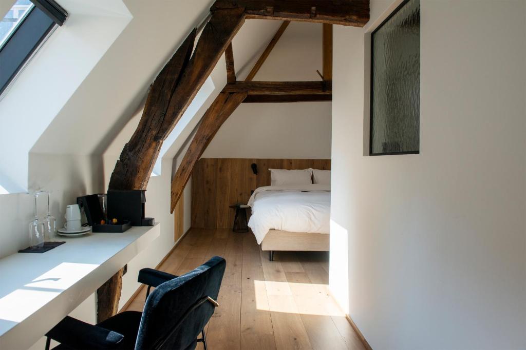 Postel nebo postele na pokoji v ubytování Hotel Riga