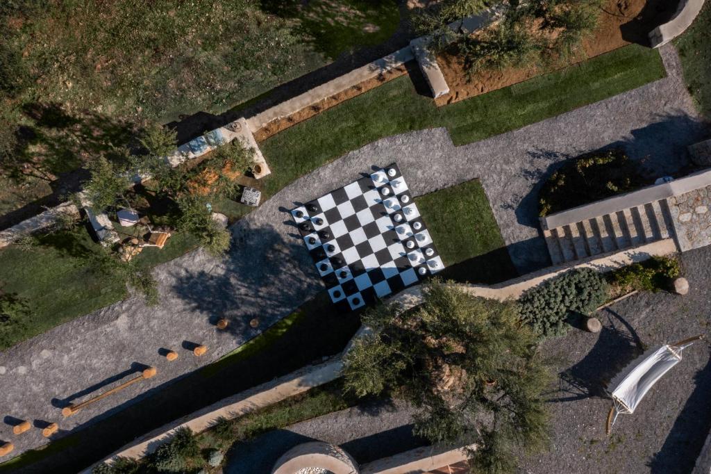 an overhead view of a checkered race track at The Olive Yard in Gythio