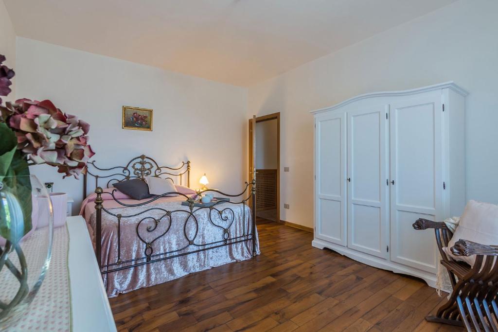 Posteľ alebo postele v izbe v ubytovaní Casale Lucy