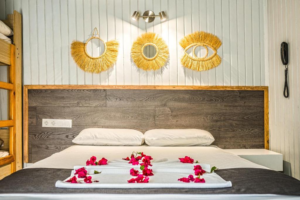 Postel nebo postele na pokoji v ubytování Leda Beach Hotel