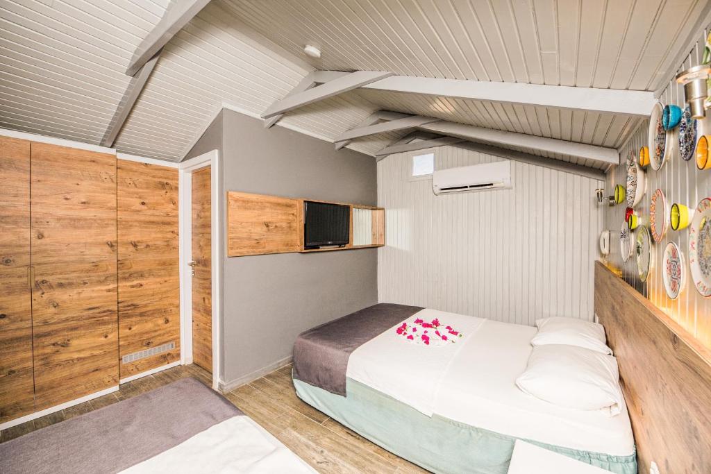 Postel nebo postele na pokoji v ubytování Leda Beach Hotel