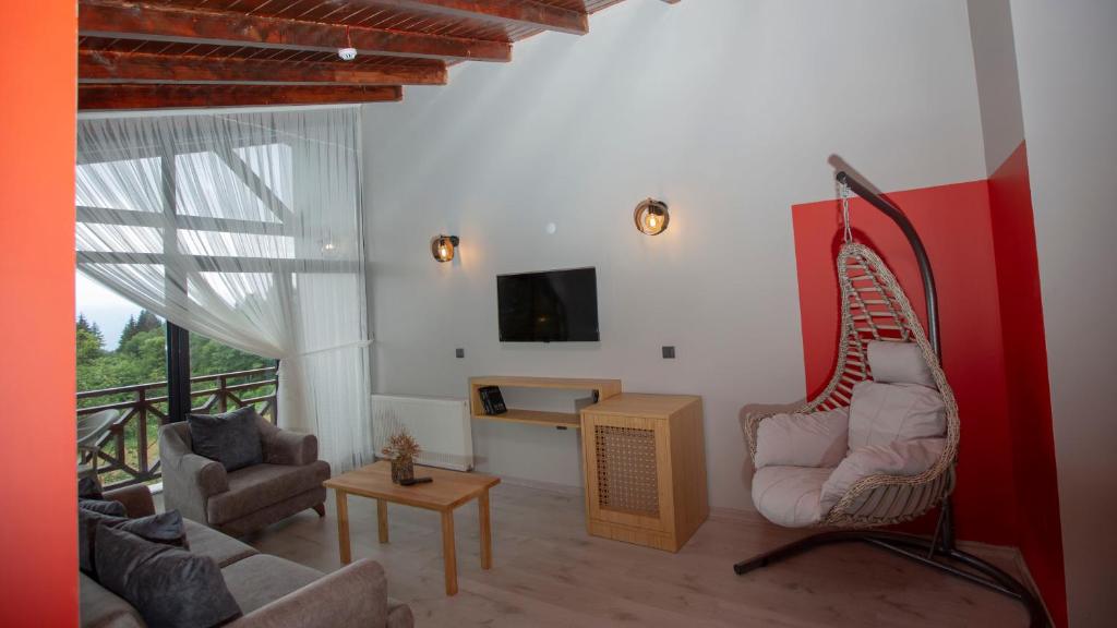 A television and/or entertainment centre at İspendam Tess Otel