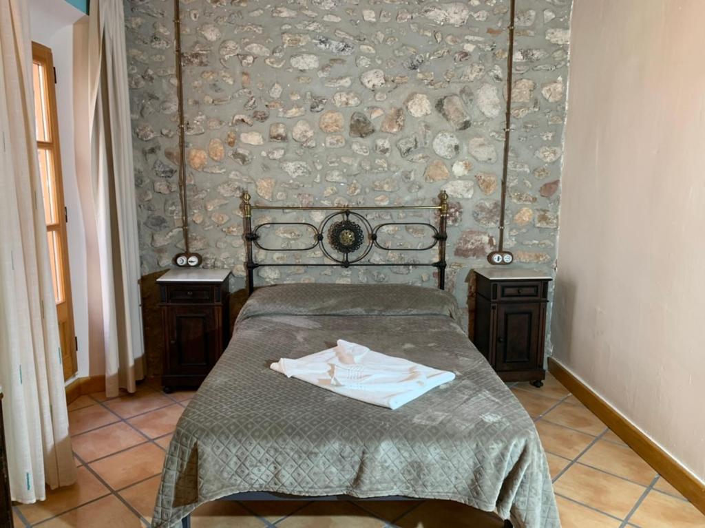 Ліжко або ліжка в номері Casa Rural con encanto en el casco antiguo Tarragona