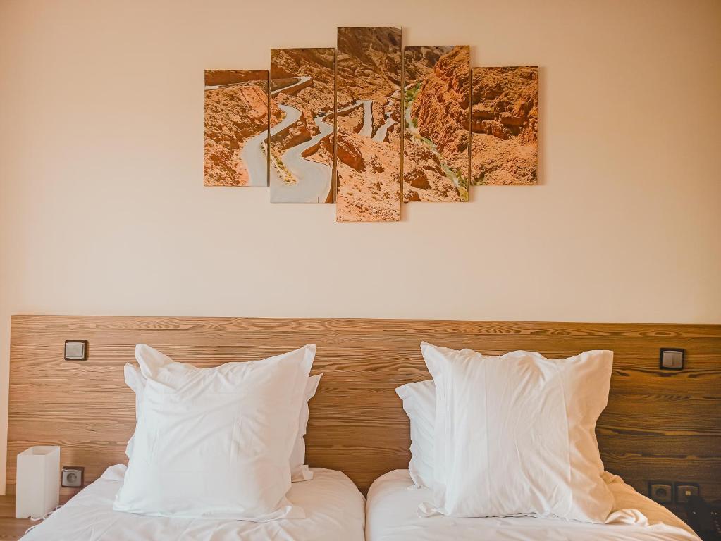 Postel nebo postele na pokoji v ubytování EL MOUSSAFIR HOTEL