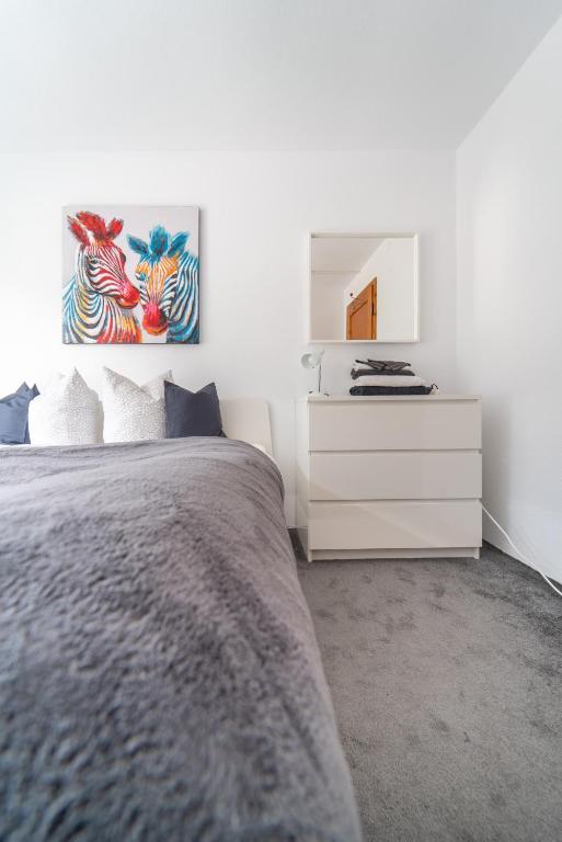 Postel nebo postele na pokoji v ubytování Urlaubsplatzl Appartements