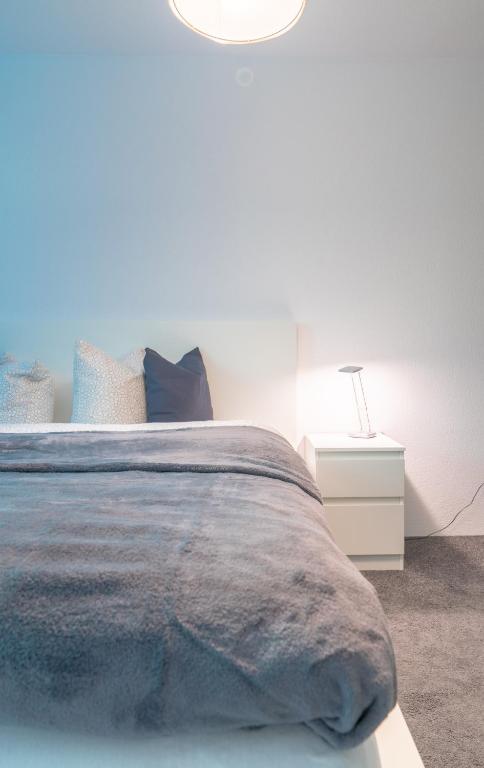 Postel nebo postele na pokoji v ubytování Urlaubsplatzl Appartements