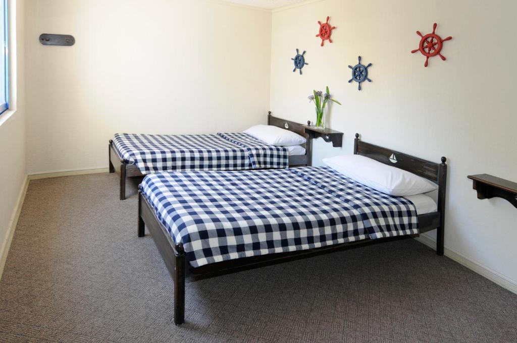 Postel nebo postele na pokoji v ubytování MR Mar Suites (ex Neruda Mar Suites)